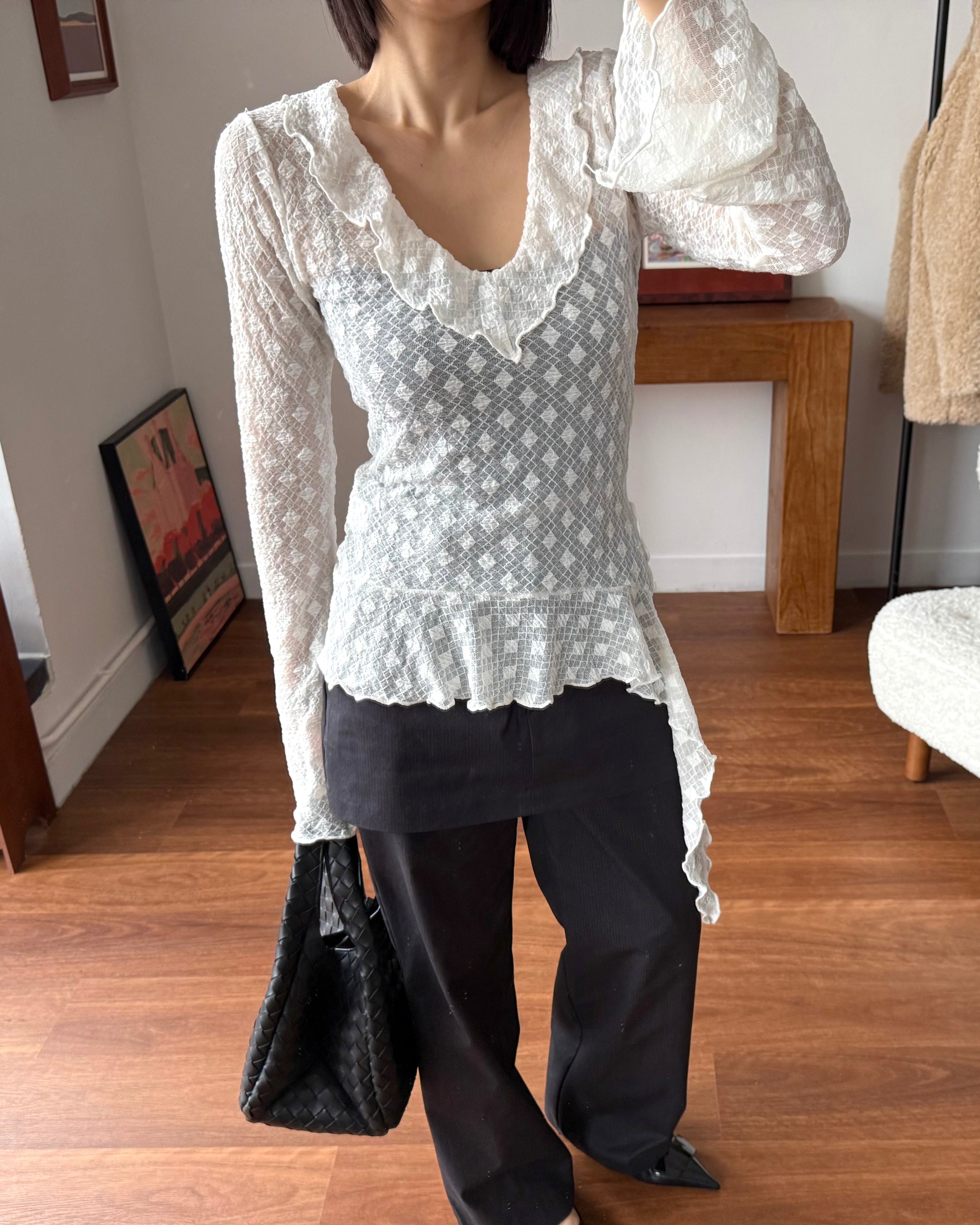 City Date... Lace that speaks in whispers — delicate form held by quiet intent.